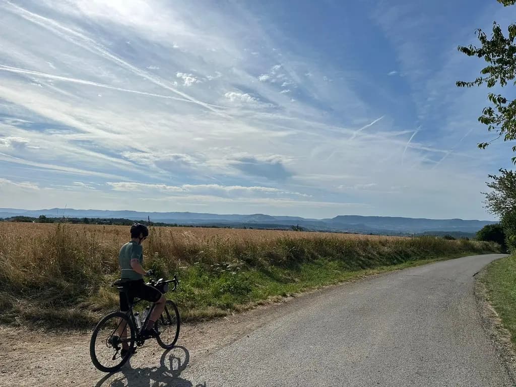 Me on my bike with a beautiful landscape in the background